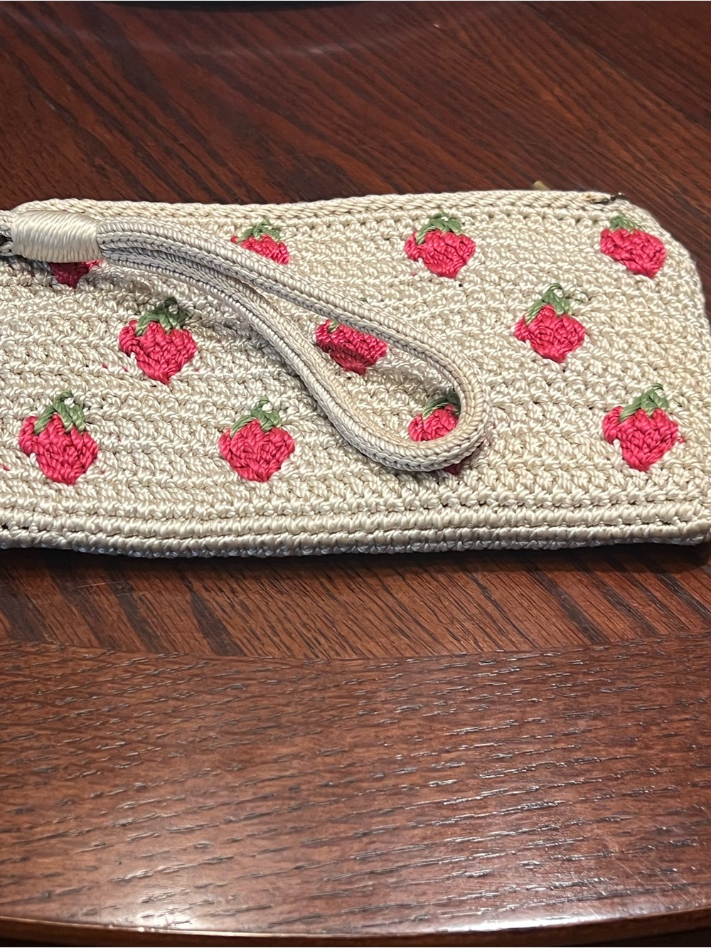 The Sak Beige Crochet Wristlet Clutch with Pink Strawberry Embroidery